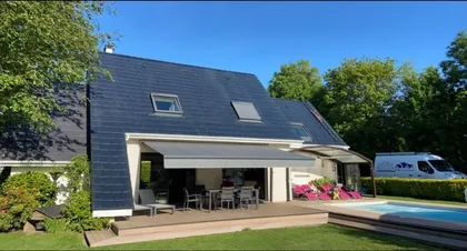 Fenêtres de toit intégrées dans une couverture en ardoise